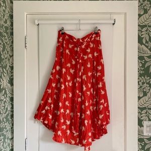 ANTHROPOLOGIE — red flowy midi skirt by porridge